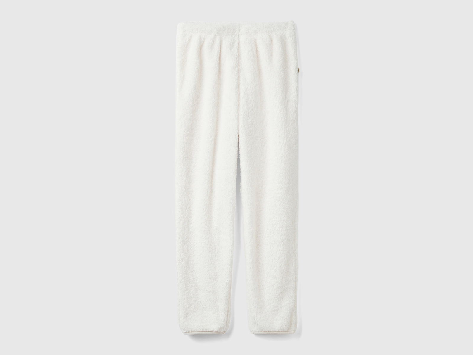 Joggers in pelliccia sintetica da donna bianco panna | Benetton Outlet