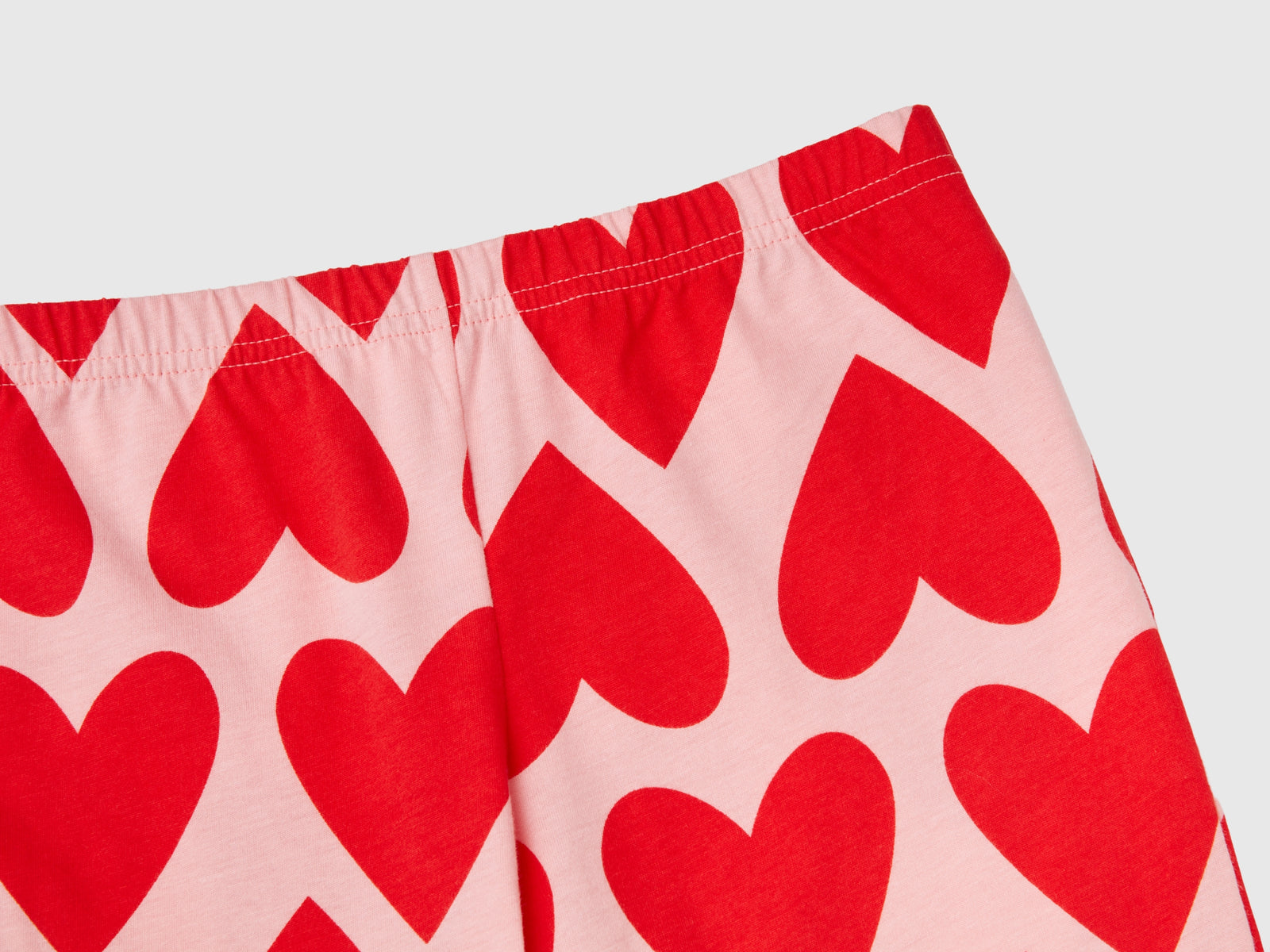 Pigiama a cuori in cotone a fibra lunga da bambina rosa 3 | Benetton Outlet