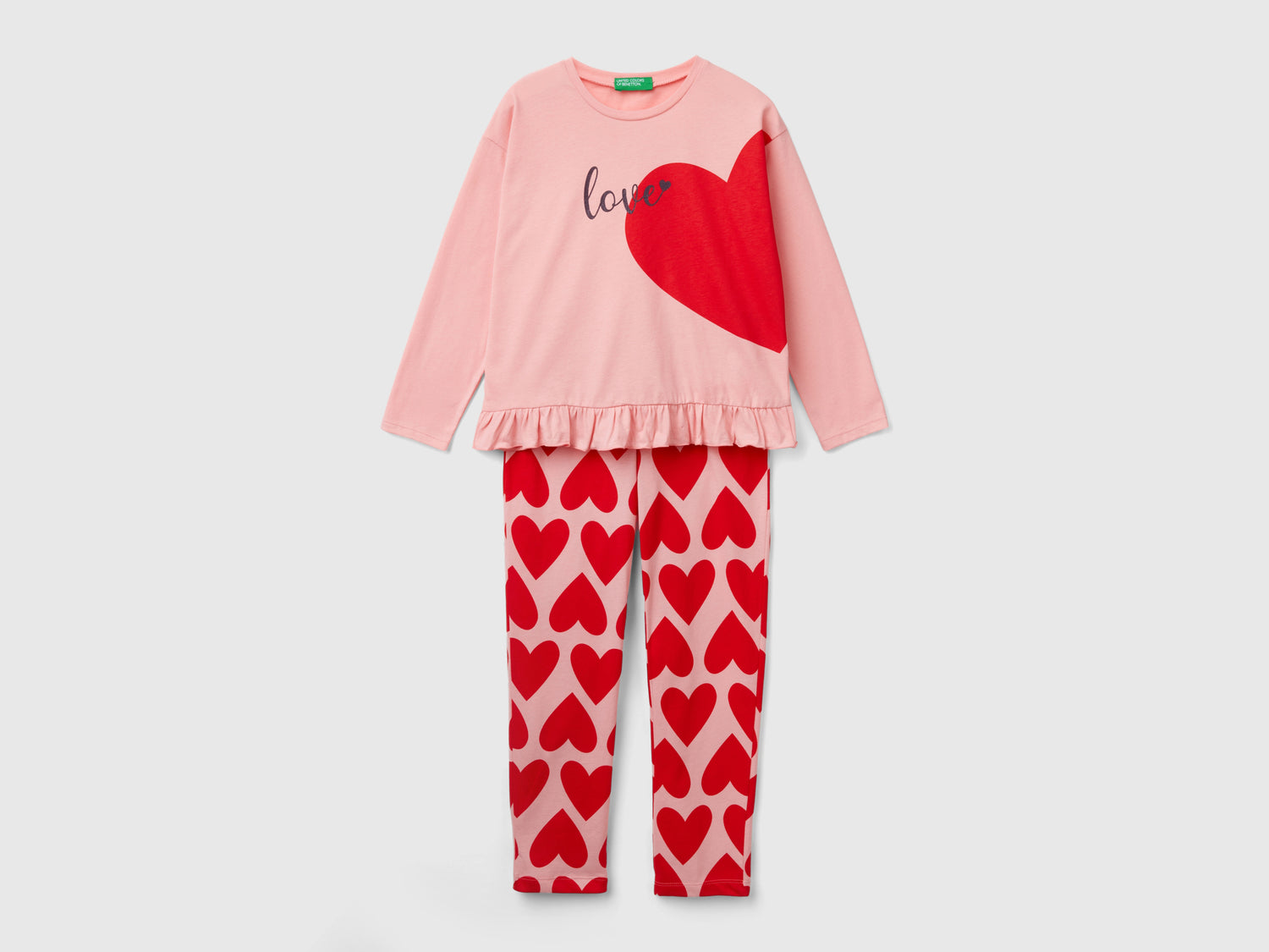 Pigiama a cuori in cotone a fibra lunga da bambina rosa | Benetton Outlet