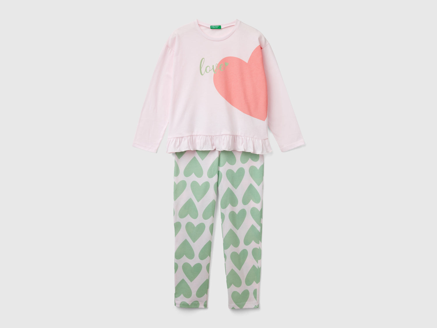 Pigiama a cuori in cotone a fibra lunga da bambina rosa tenue | Benetton Outlet