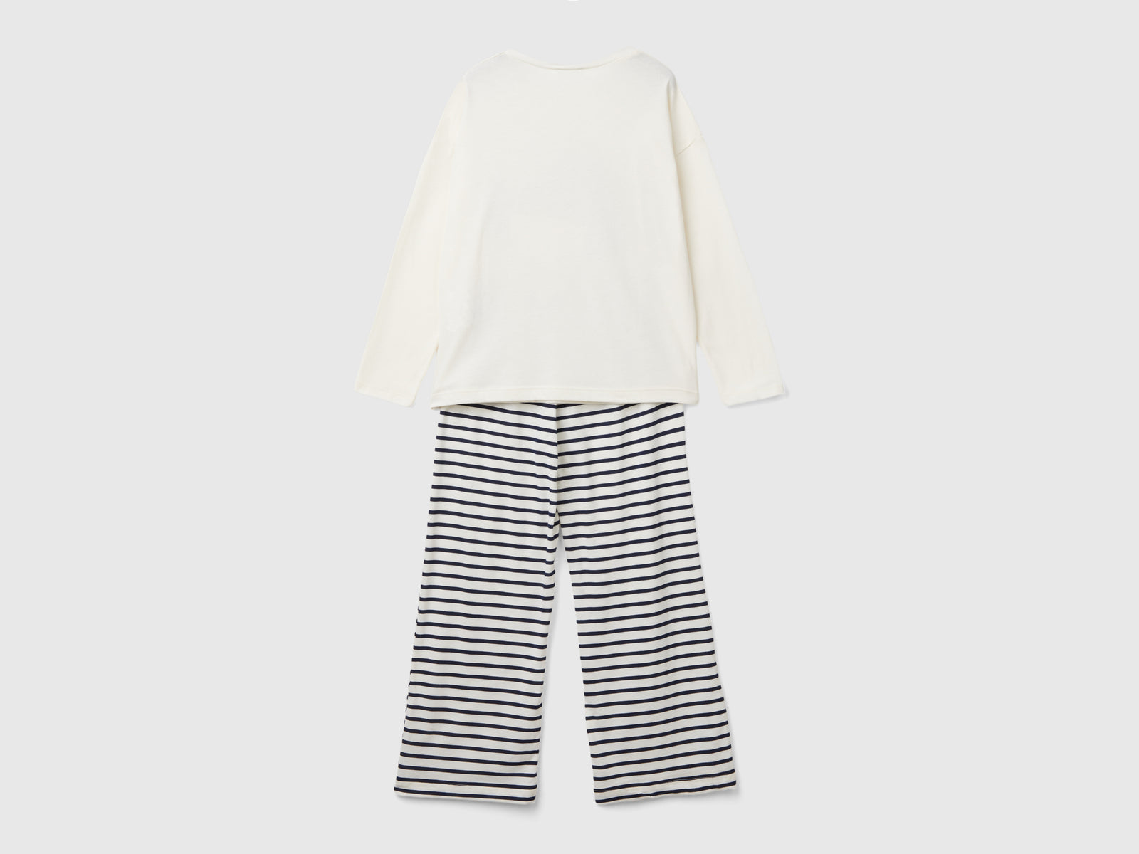 Pigiama con stampa bambolina da bambina bianco panna 2 | Benetton Outlet