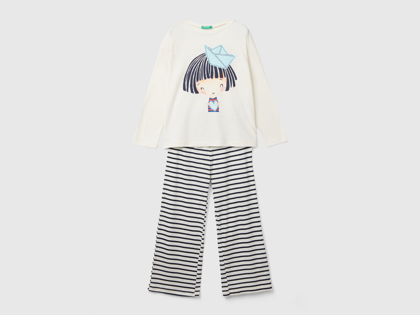 Pigiama con stampa bambolina da bambina bianco panna | Benetton Outlet