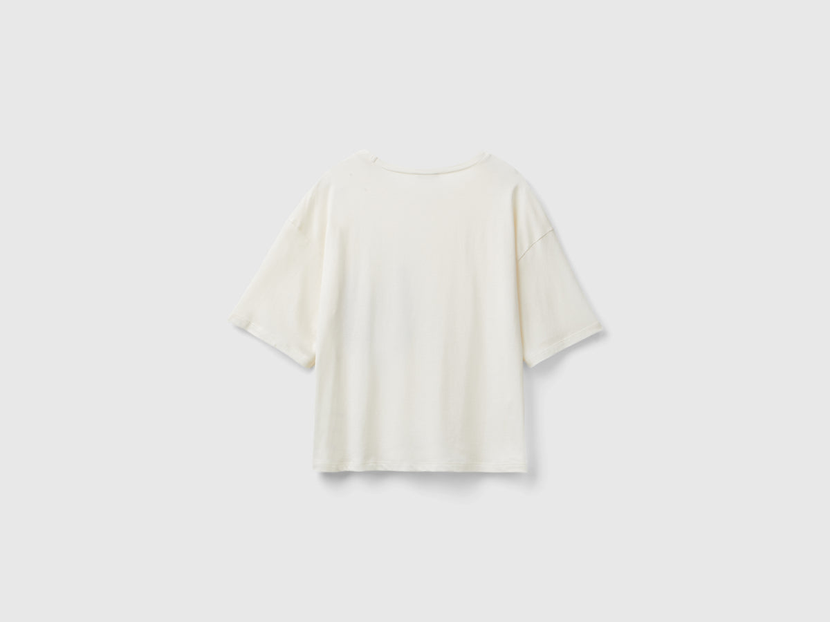 T-shirt boxy fit con taschino