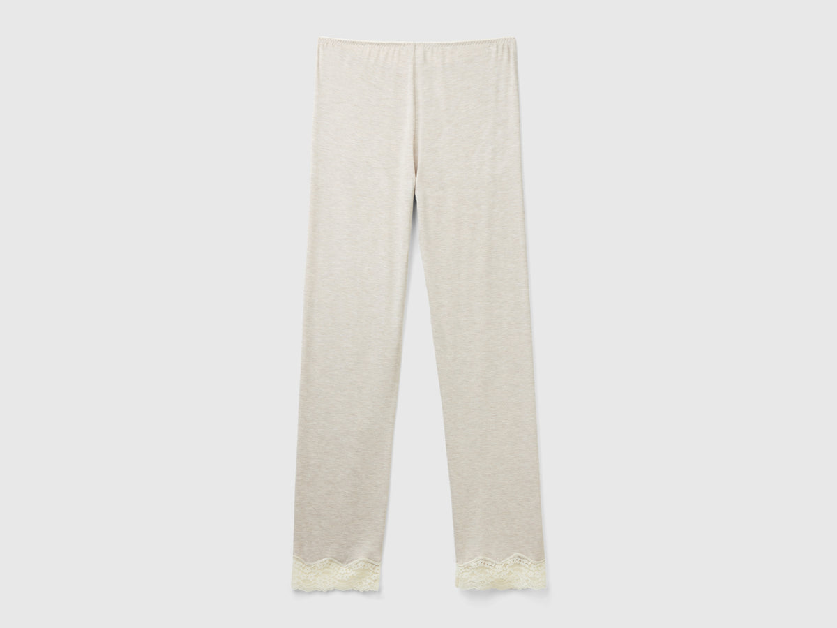 Pantaloni con dettagli in pizzo
