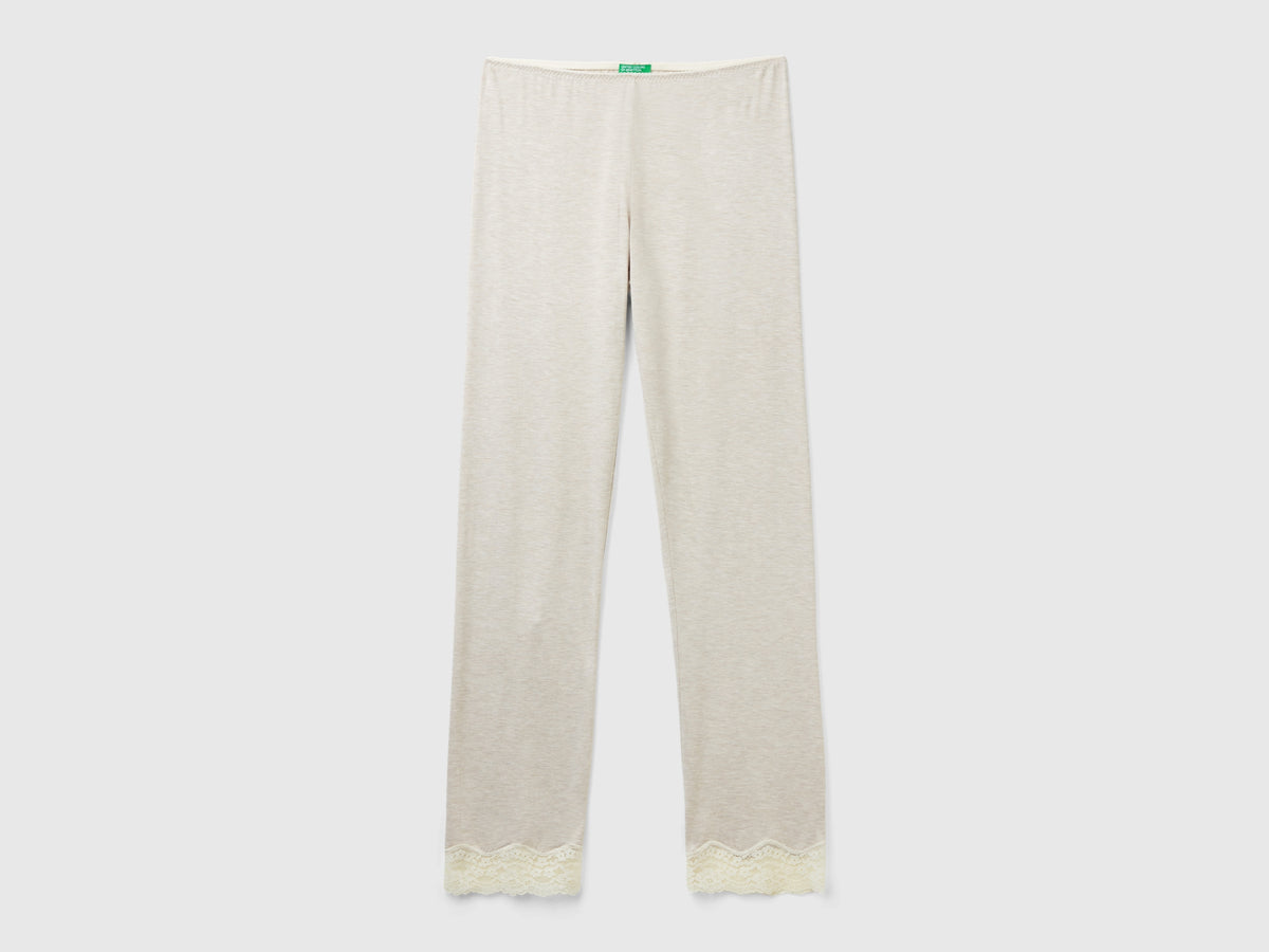 Pantaloni con dettagli in pizzo