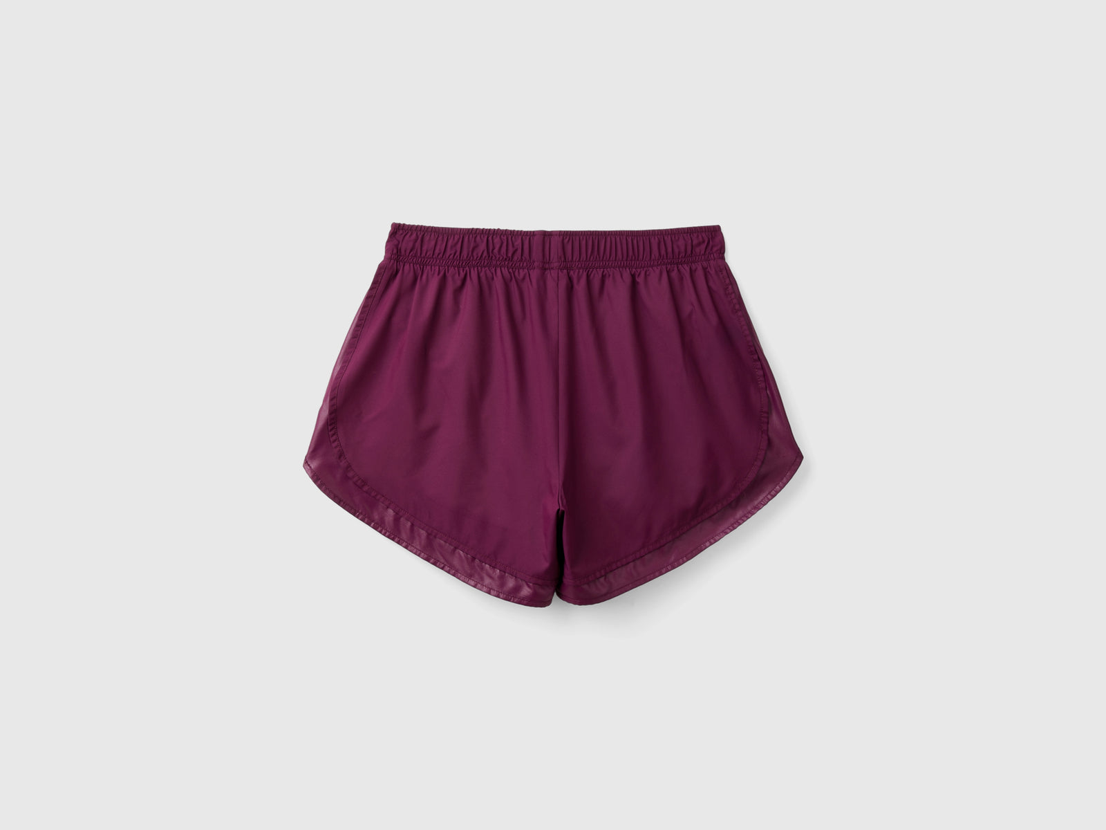 Shorts sportivi con tessuto riciclato da donna malva scuro 2 | Benetton Outlet