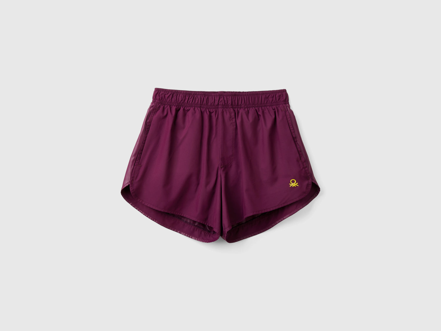 Shorts sportivi con tessuto riciclato da donna malva scuro | Benetton Outlet