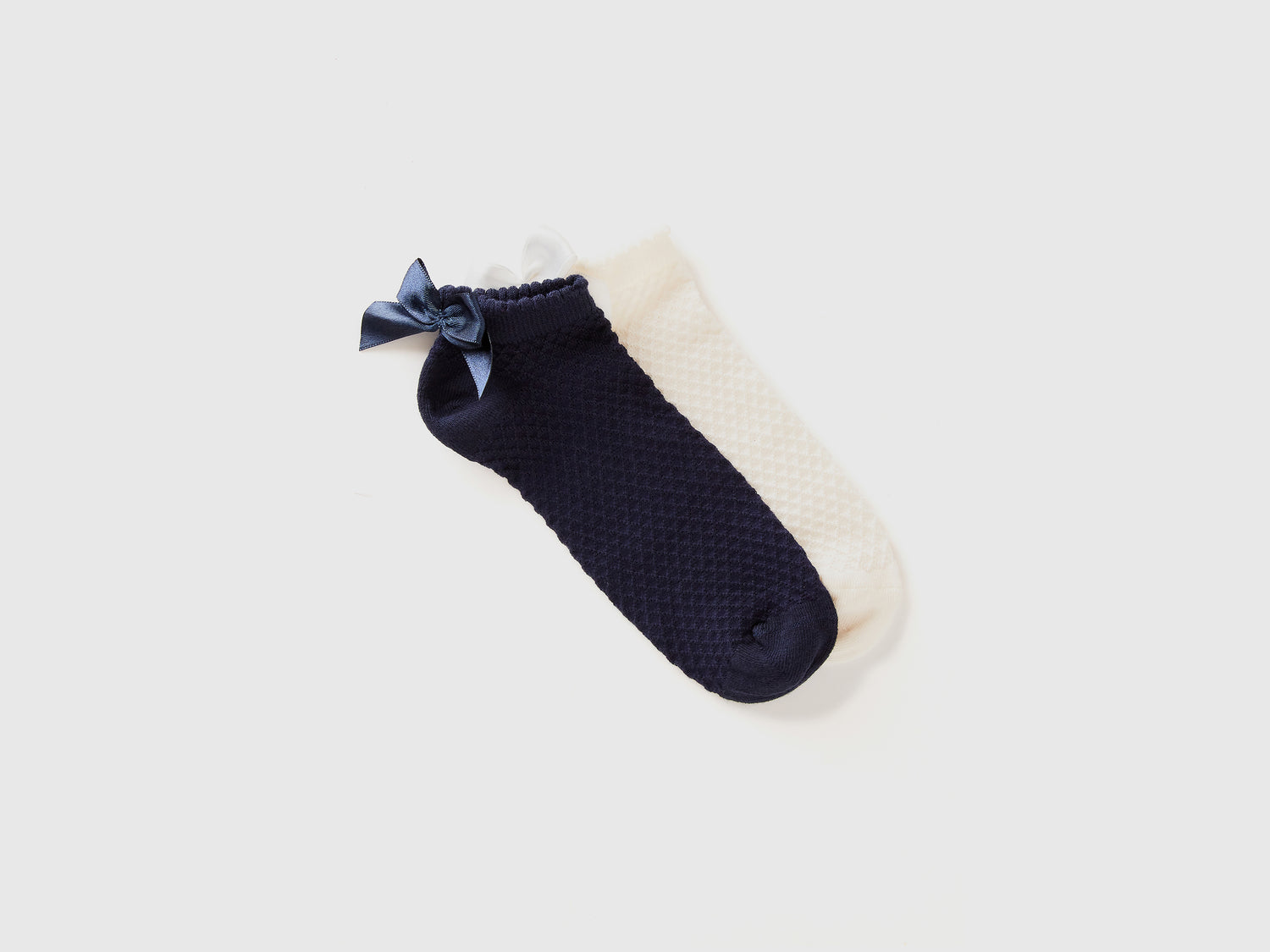 Calzini corti con fiocchetto da bambina multi-color | Benetton Outlet
