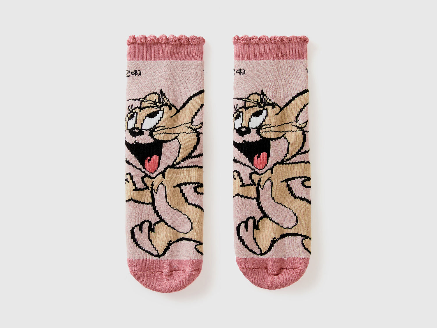 Calzini antiscivolo Tom & Jerry da bambino rosa tenue | Benetton Outlet