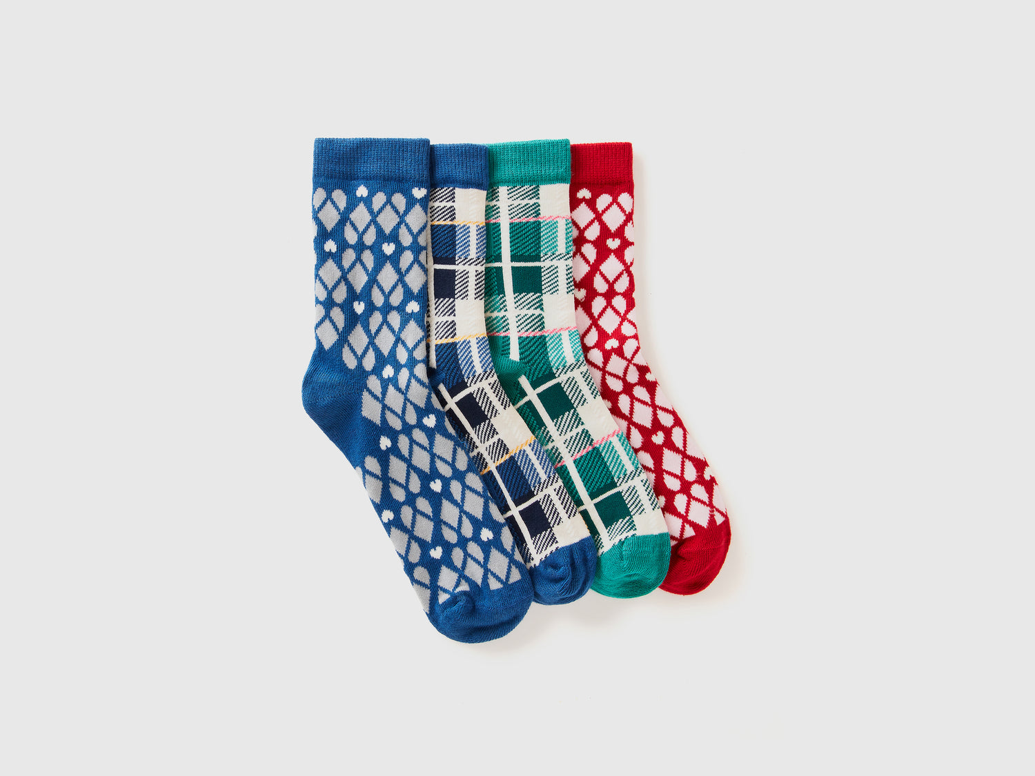 Quattro paia di calzini fantasia da bambino multi-color | Benetton Outlet