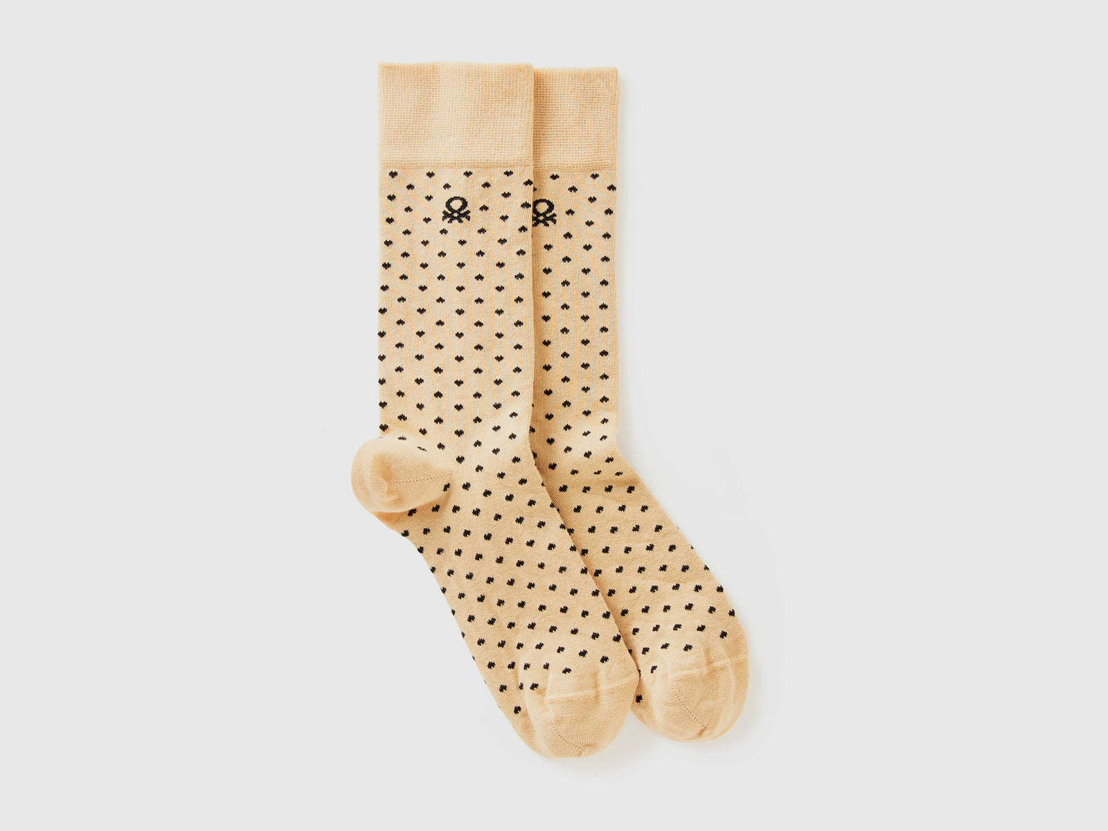 Calzini lunghi a cuori da uomo beige | Benetton Outlet