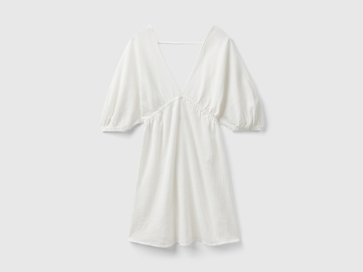 Vestito corto 100% cotone da donna bianco panna | Benetton Outlet