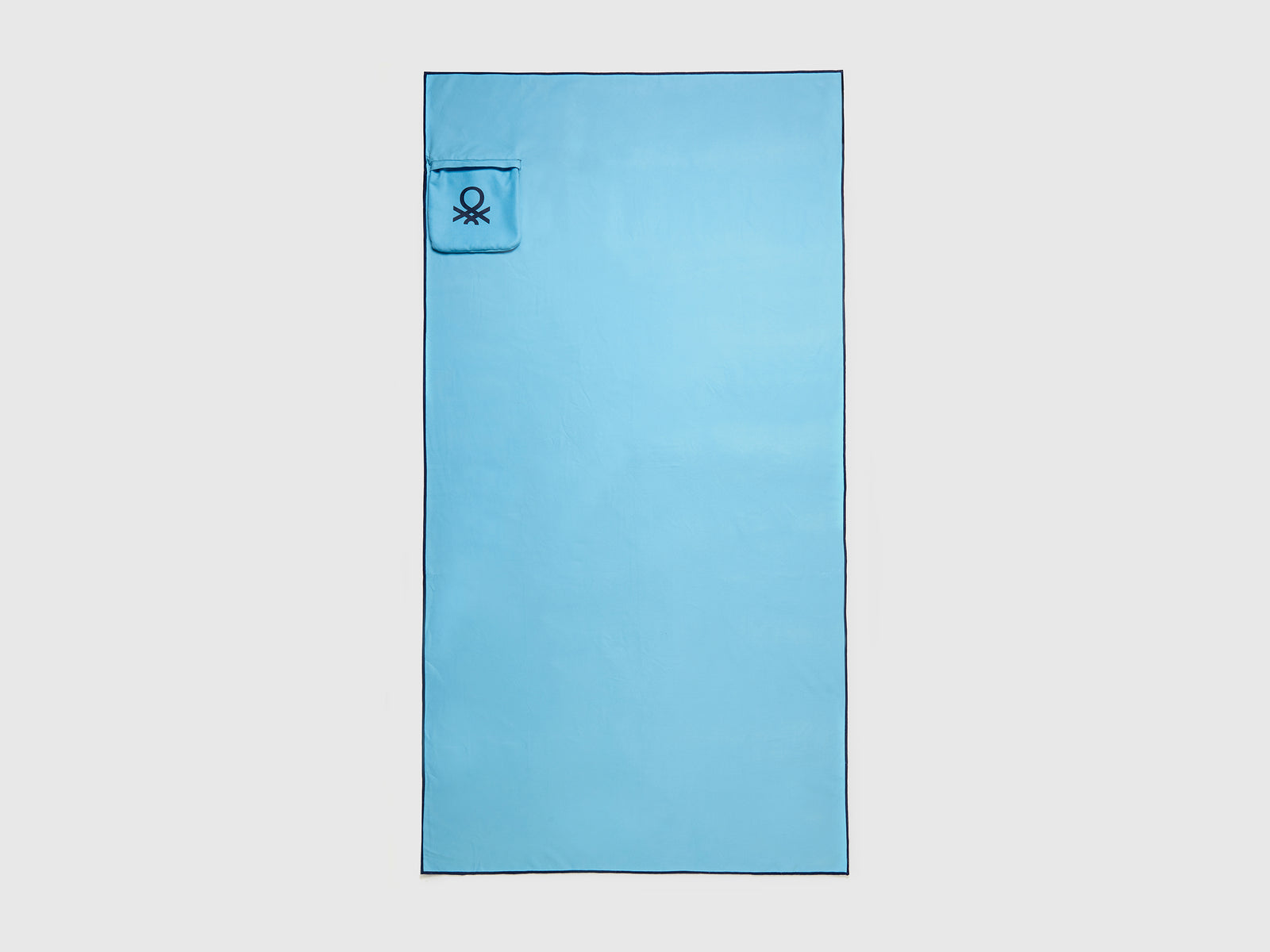 Telo mare con bordo a contrasto da uomo celeste | Benetton Outlet