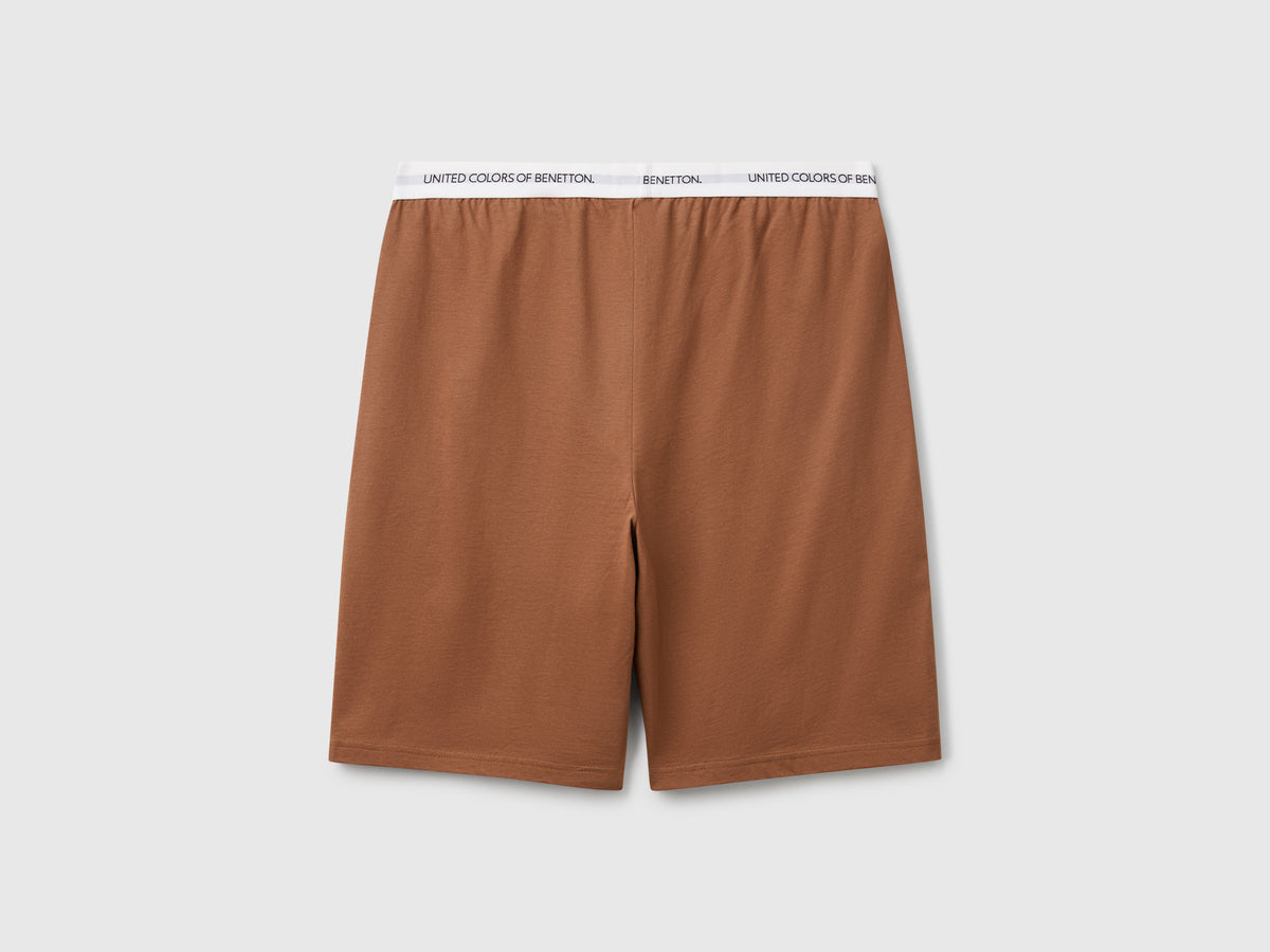 Shorts con elastico logato