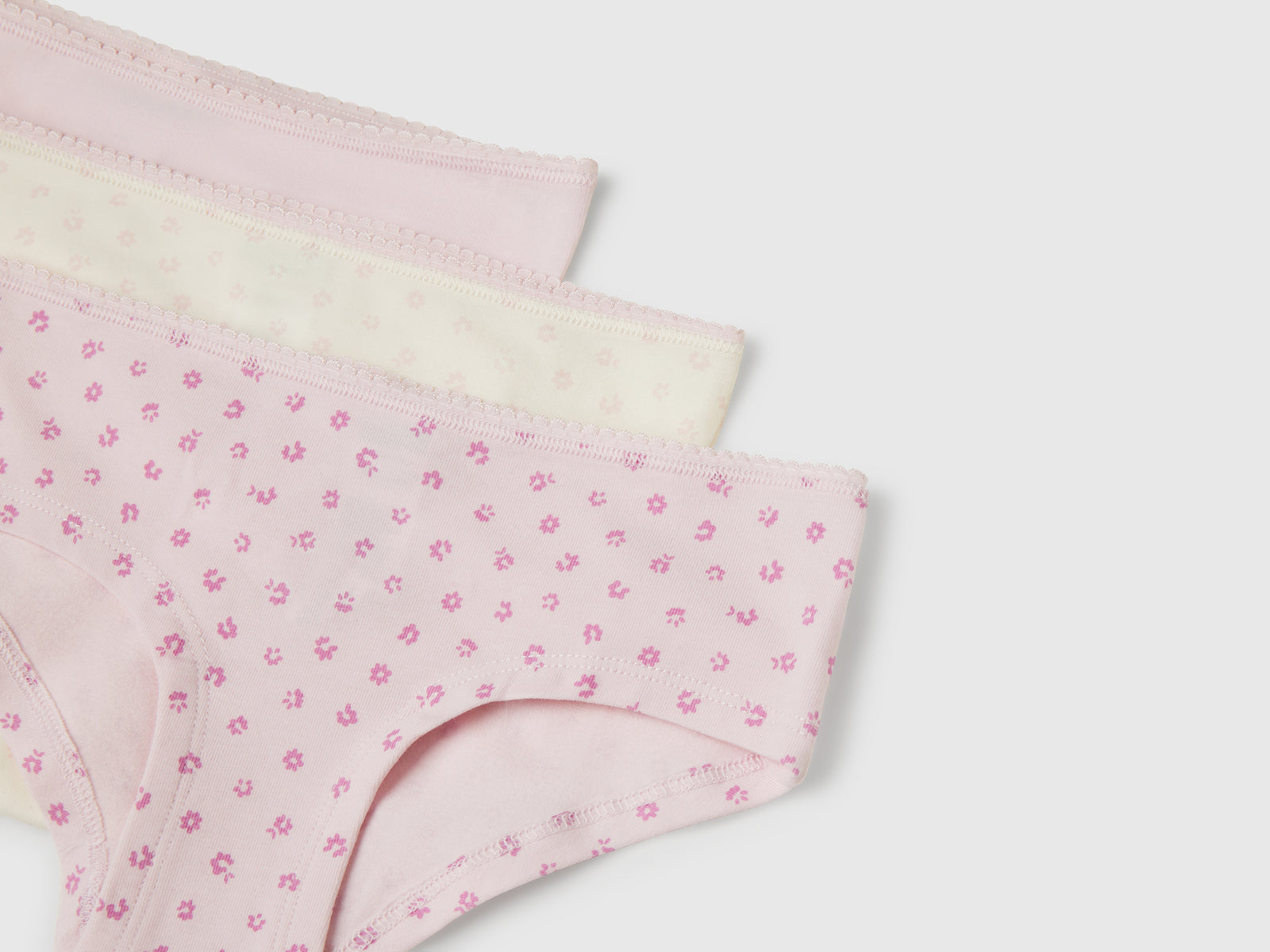 Tre slip in cotone stretch da bambina bianco panna 3 | Benetton Outlet