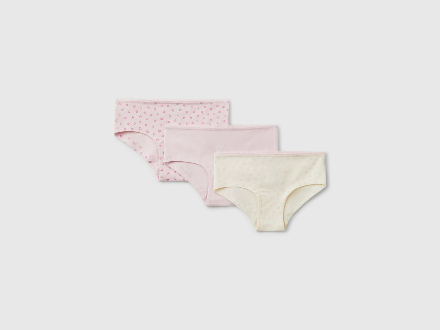 Tre slip in cotone stretch da bambina bianco panna | Benetton Outlet