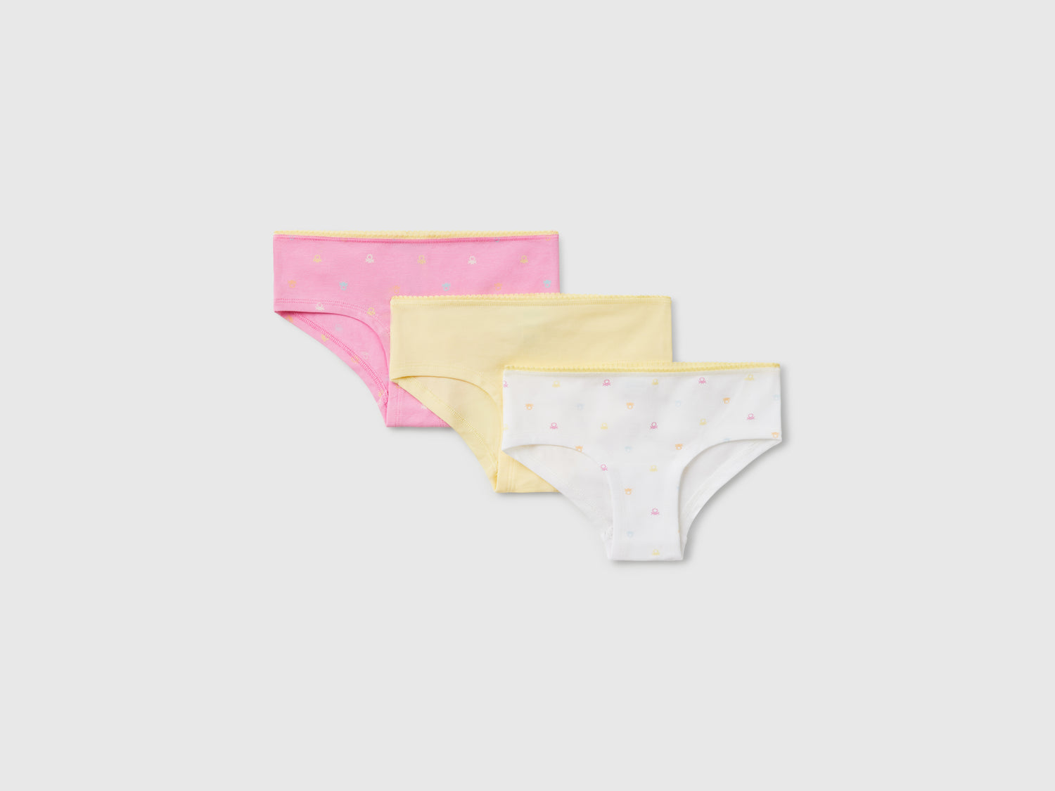 Tre slip in cotone stretch da bambina multi-color | Benetton Outlet