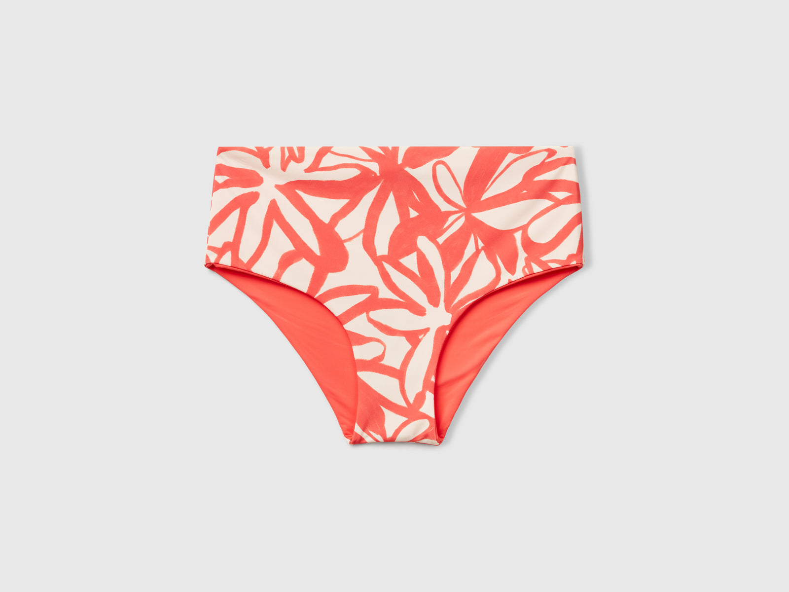 Slip costume reversibile da donna salmone | Benetton Outlet
