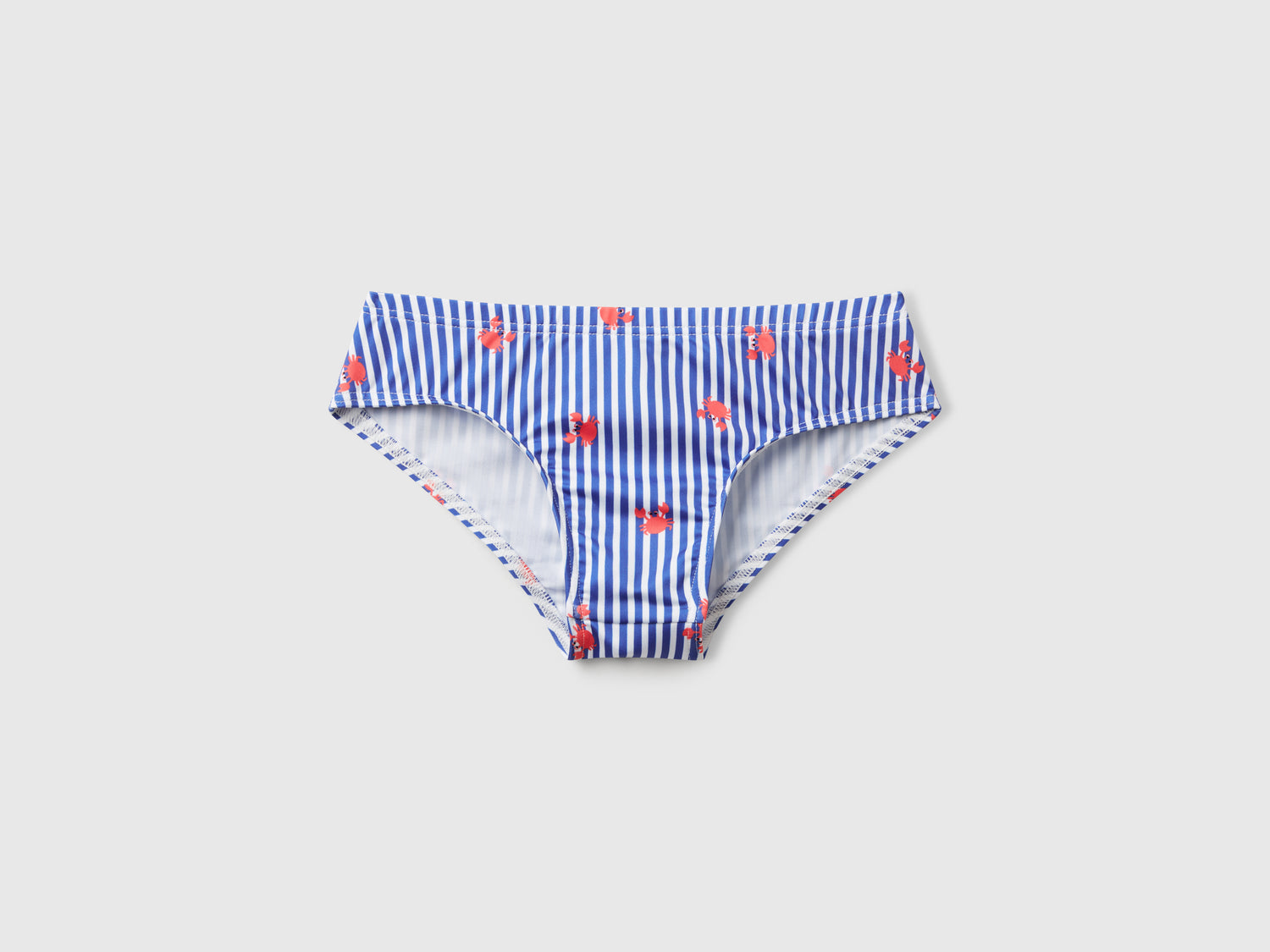 Slip mare a righe con stampa granchi da bambino blu | Benetton Outlet