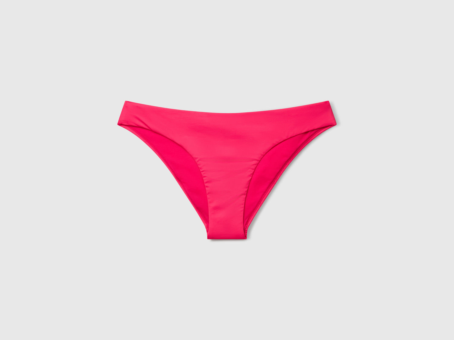 Slip costume basico in ECONYL® da donna fucsia | Benetton Outlet