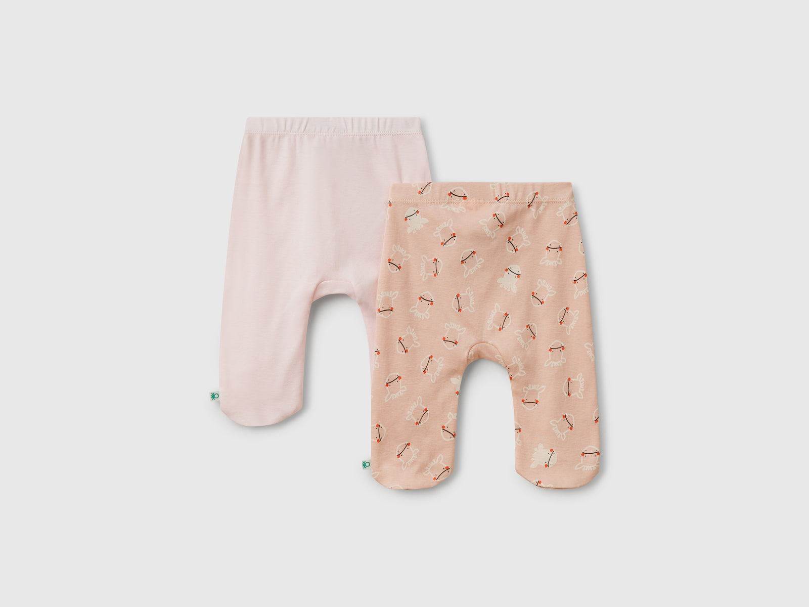 Due pantaloni in cotone da neonato rosa tenue 2 | Benetton Outlet
