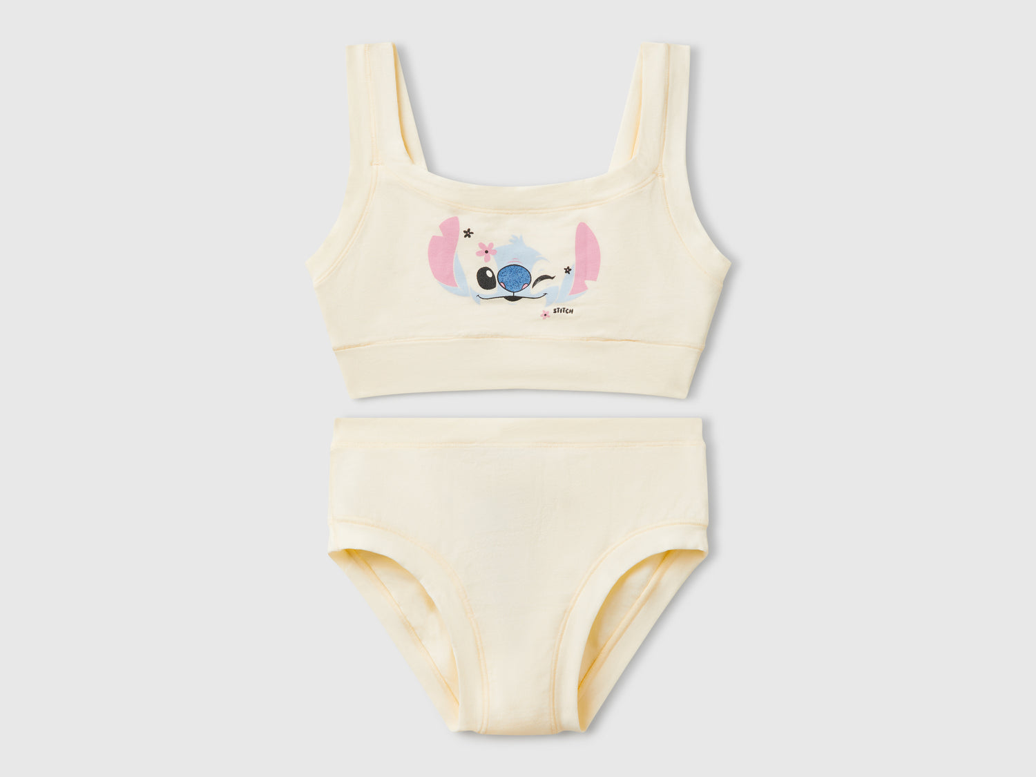 Completo top e slip Lilo & Stitch ©Disney da bambina bianco panna | Benetton Outlet