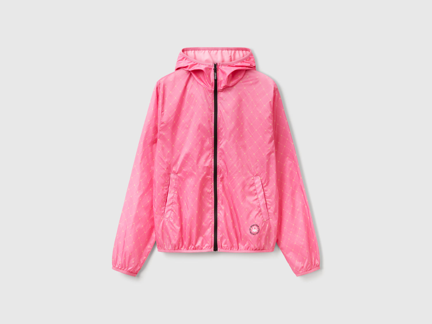 Giubbino in nylon con stampa loghi da donna rosa | Benetton Outlet