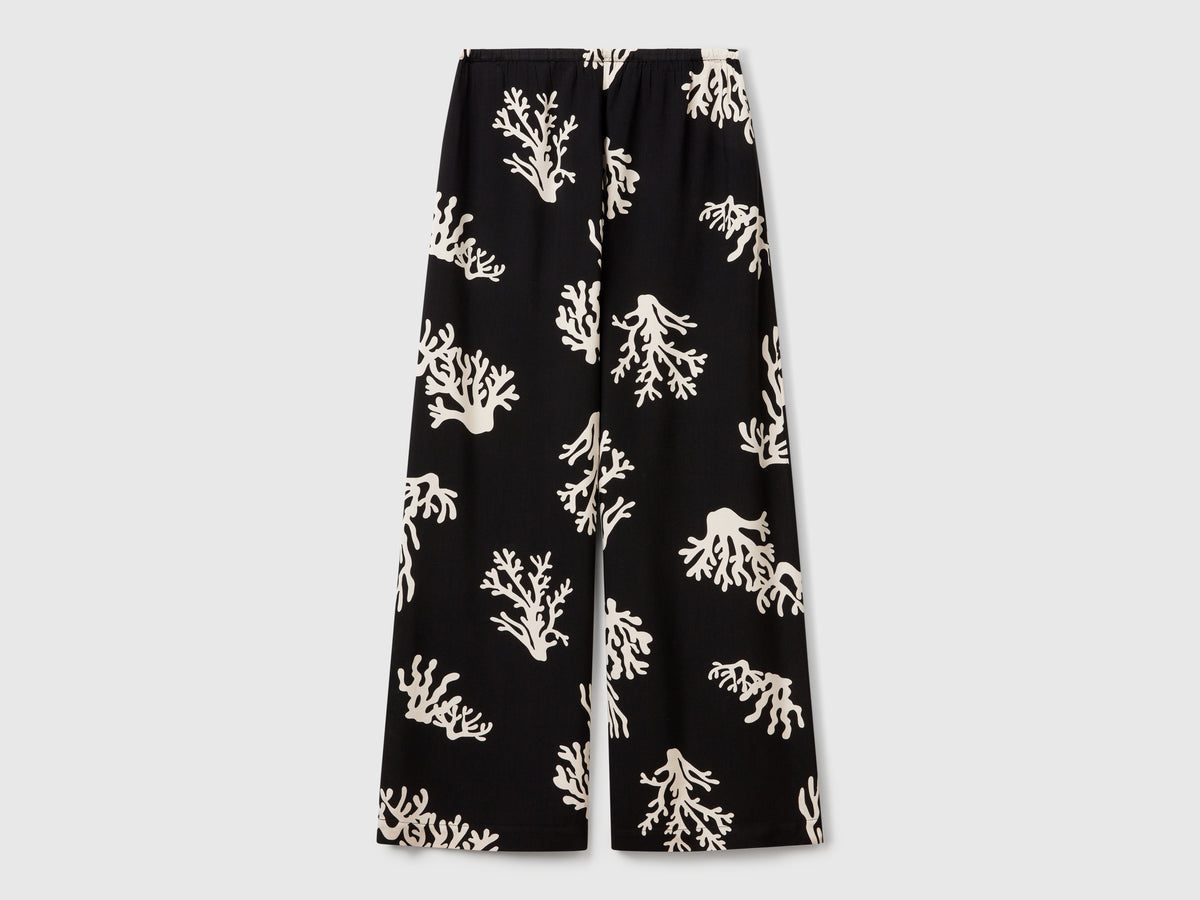 Pantaloni con stampa coralli
