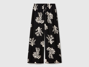 Pantaloni con stampa coralli
