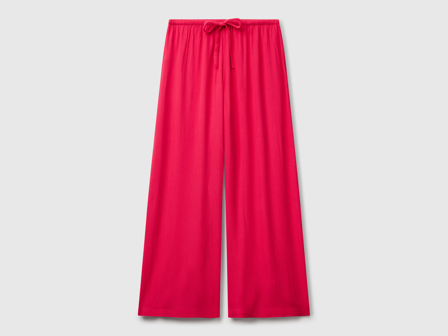 Pantaloni ampi fluidi da donna fucsia | Benetton Outlet