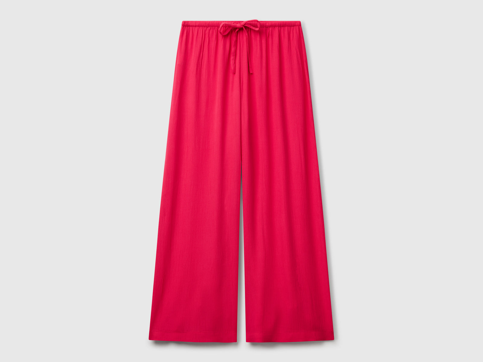 Pantaloni ampi fluidi da donna fucsia | Benetton Outlet