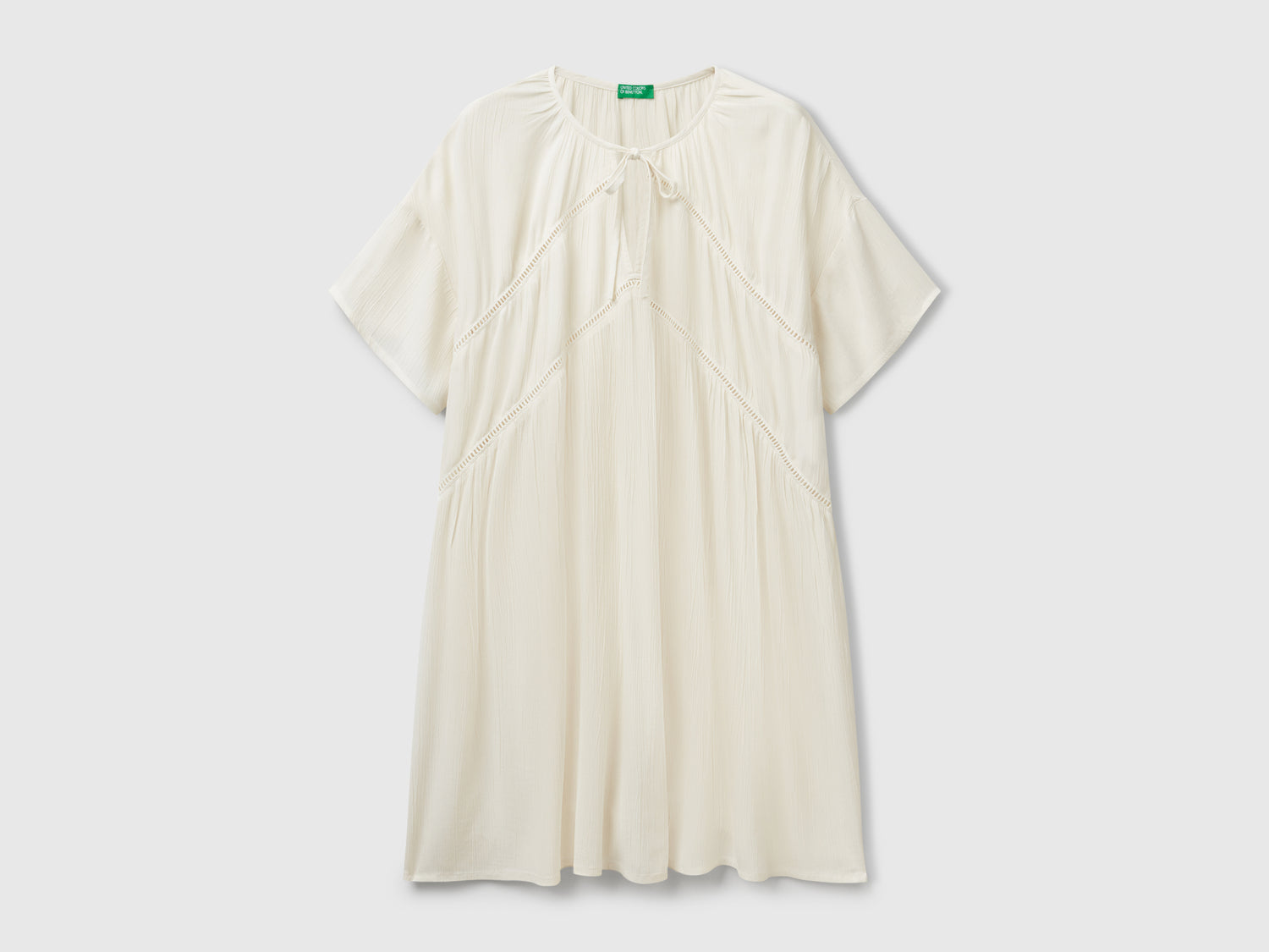 Vestito ampio corto da donna bianco panna | Benetton Outlet