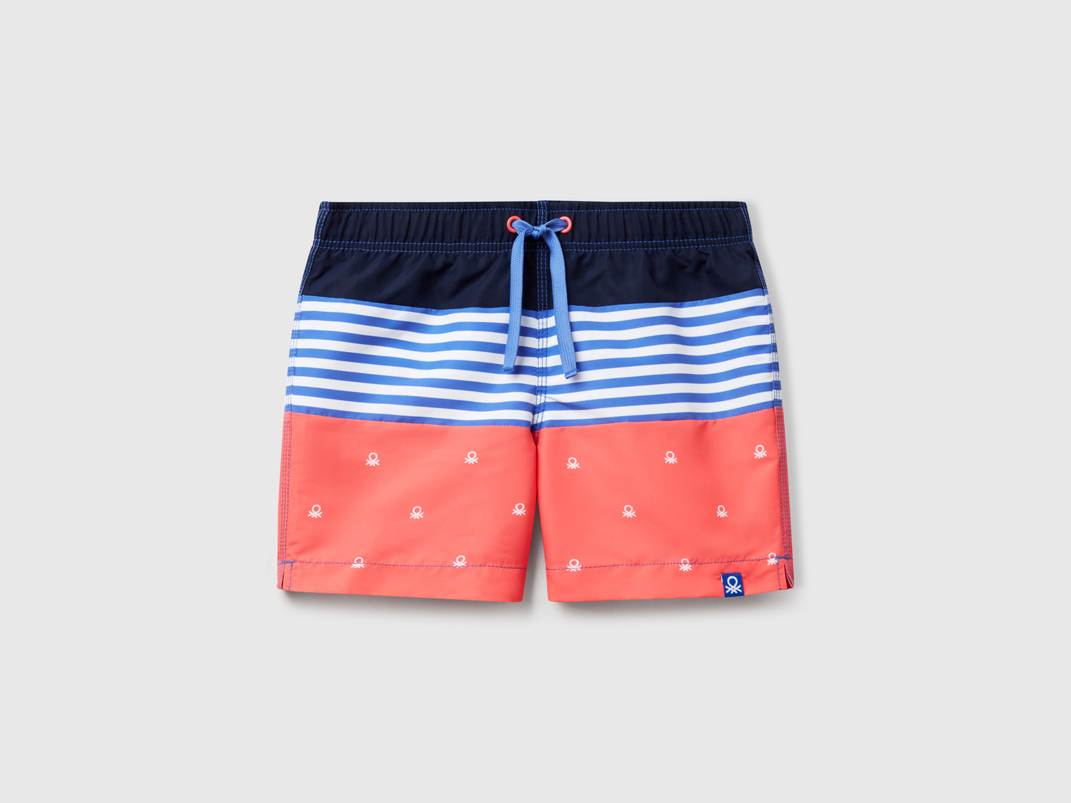Boxer mare con righe e loghi da bambino corallo | Benetton Outlet