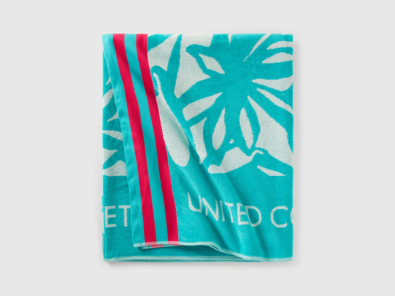 Telo mare con fantasia floreale da uomo celeste fluo 3 | Benetton Outlet