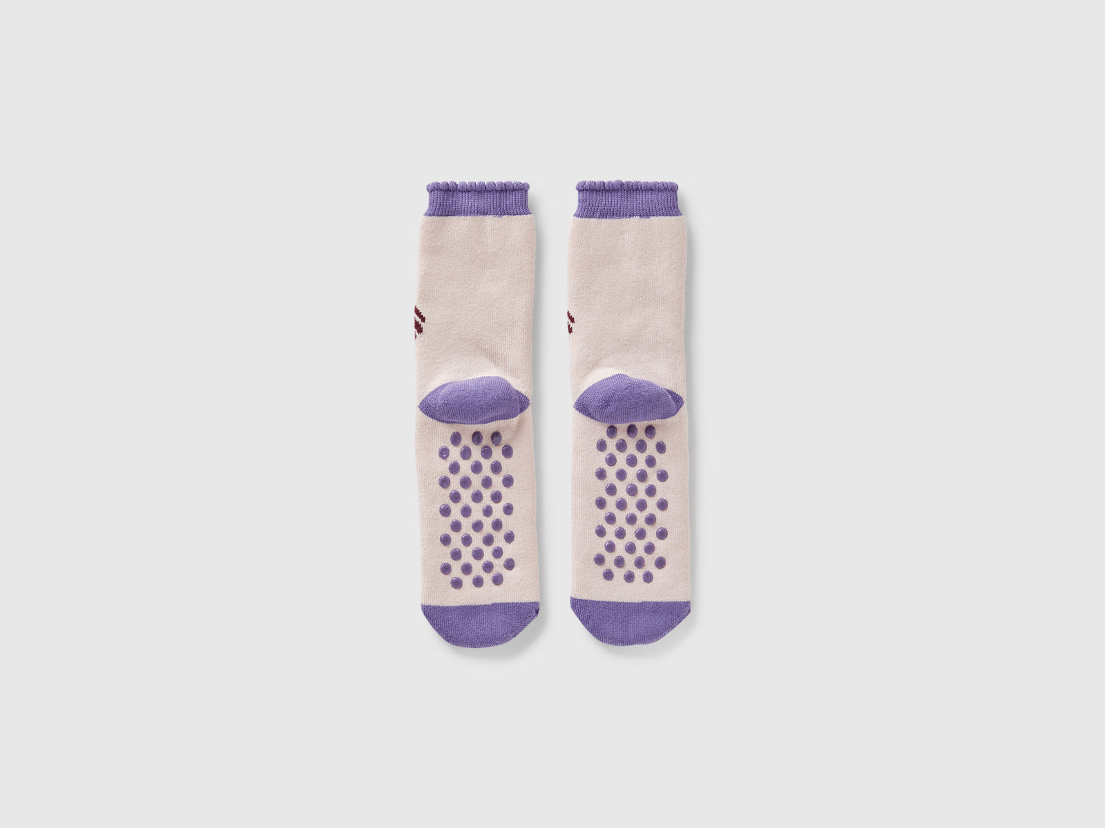 Calzini antiscivolo rosa con intarsio bambolina da bambino multi-color 2 | Benetton Outlet