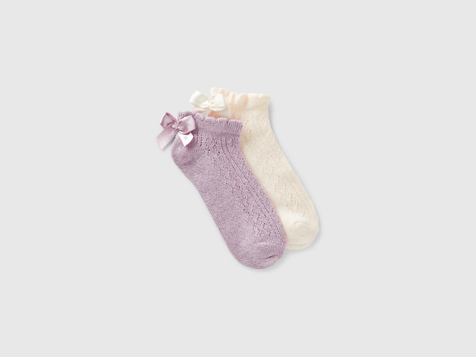 Calzini corti con fiocchetto da bambina multi-color | Benetton Outlet
