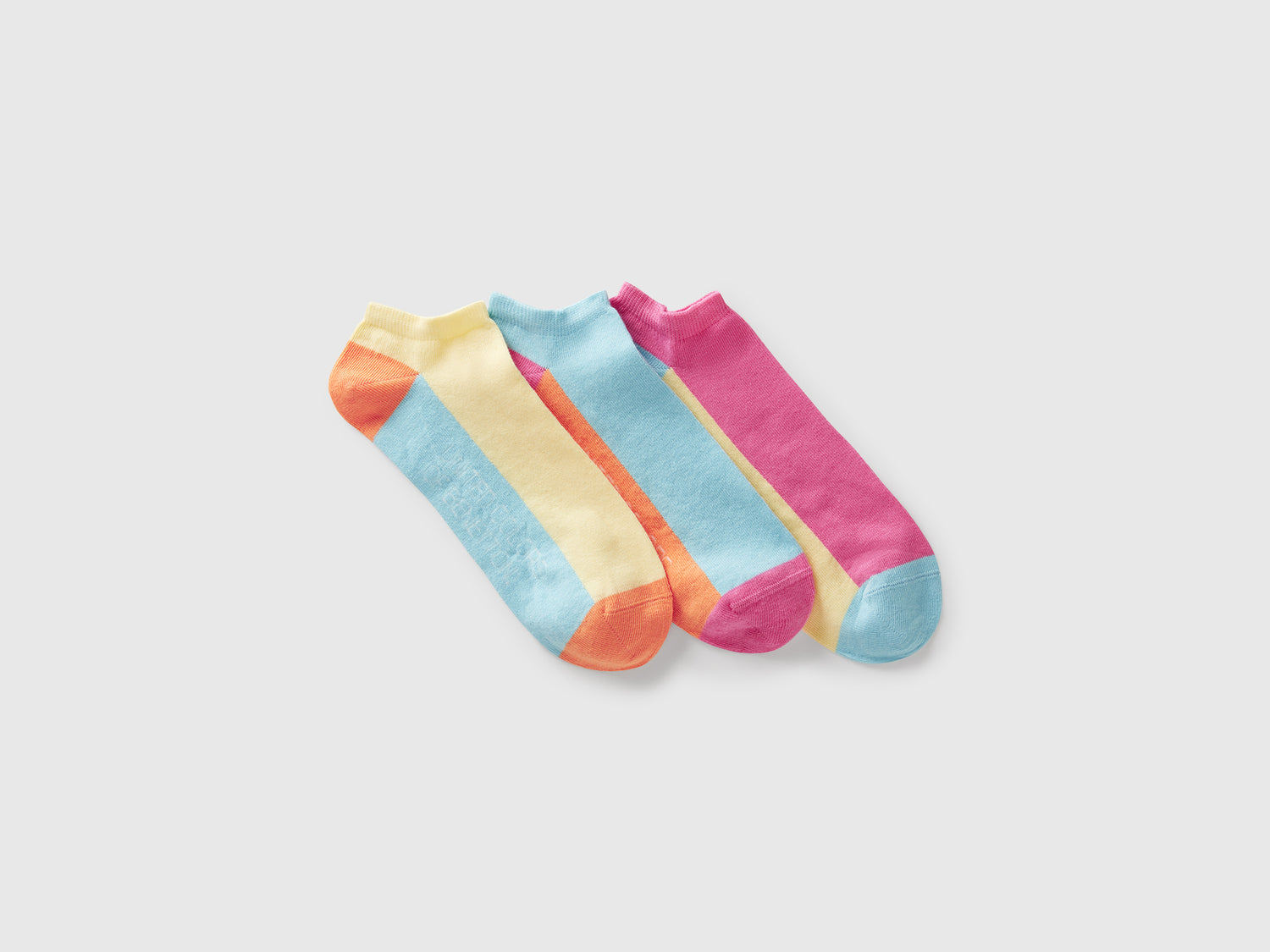 Tre paia di calzini color block da uomo multi-color | Benetton Outlet