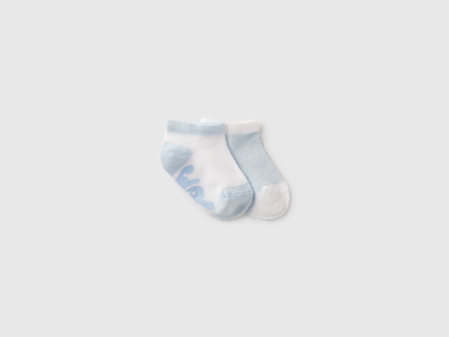 Set calzini bicolor da neonato celeste | Benetton Outlet