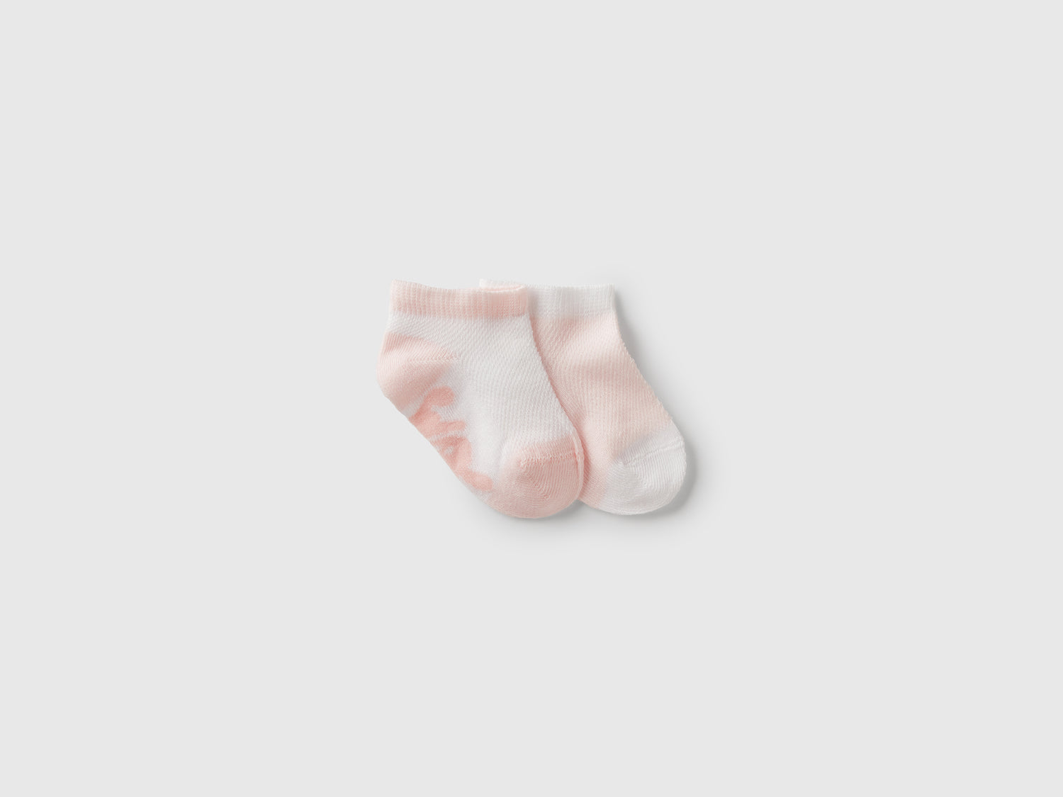 Set calzini bicolor da neonato rosa pastello | Benetton Outlet