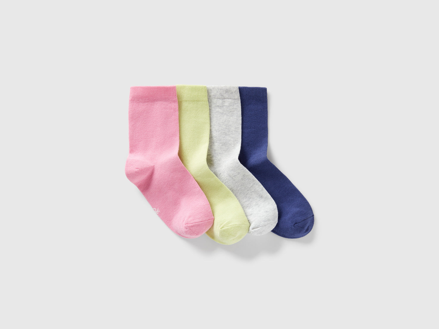 Quattro paia di calzini in cotone stretch da bambino multi-color | Benetton Outlet