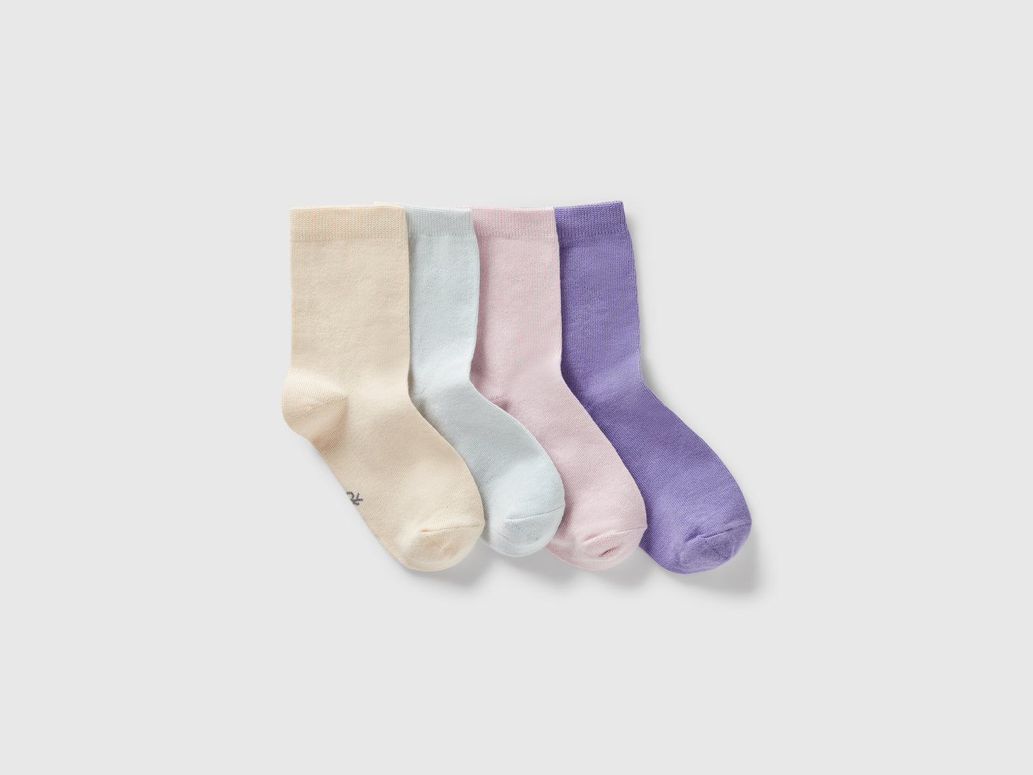 Quattro paia di calzini in cotone stretch da bambino multi-color | Benetton Outlet