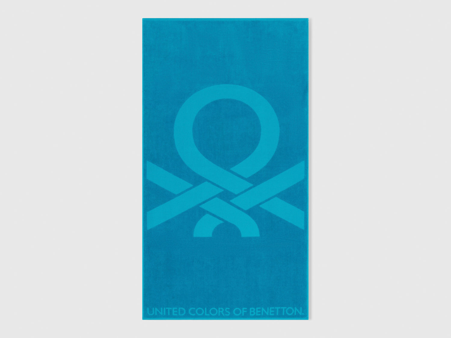 Telo mare jacquard da uomo turchese | Benetton Outlet