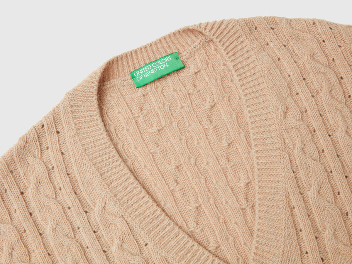 Boxy fit vest with braids and perforations