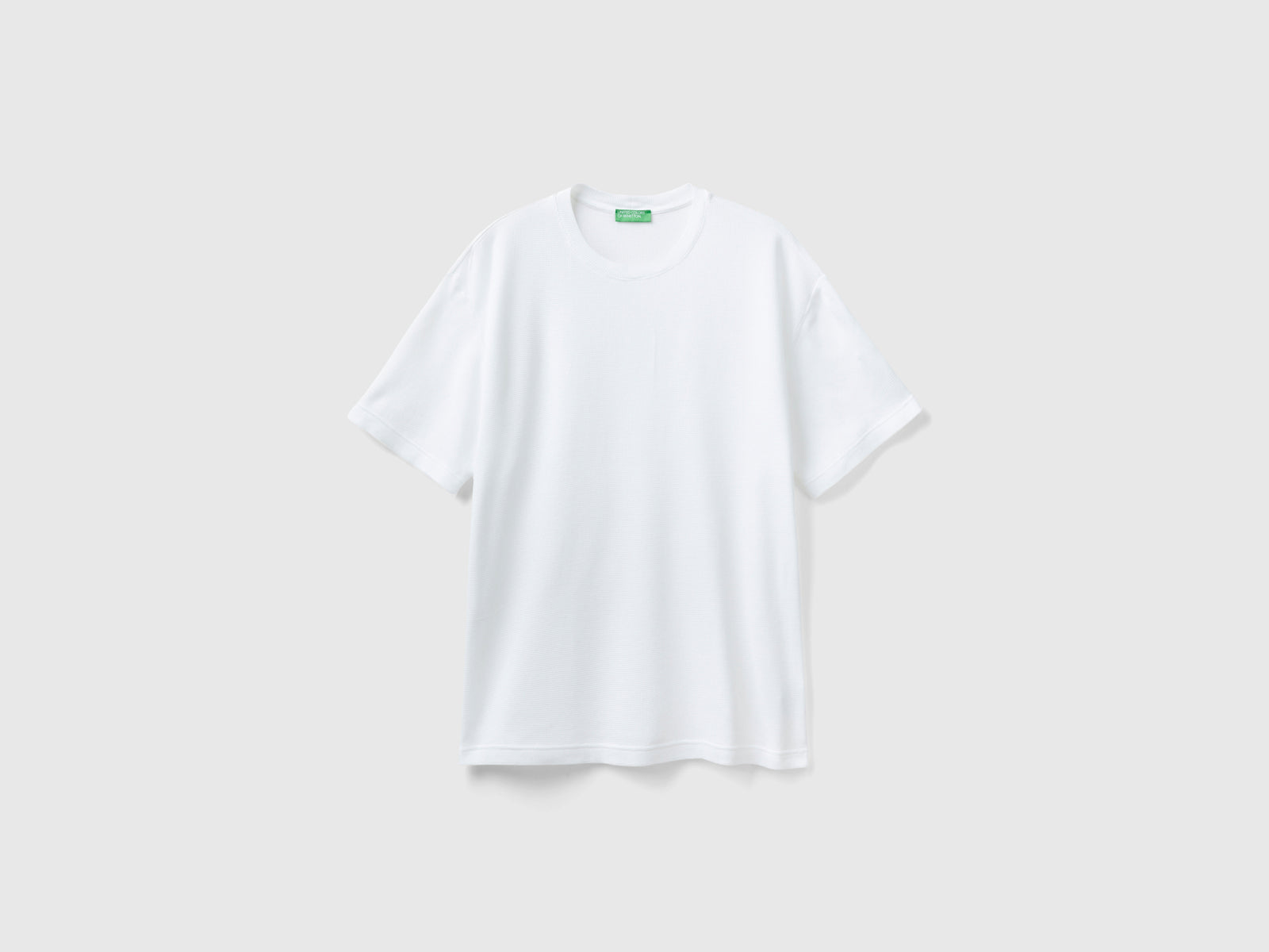 Maglietta relaxed fit da uomo bianco panna | Benetton Outlet