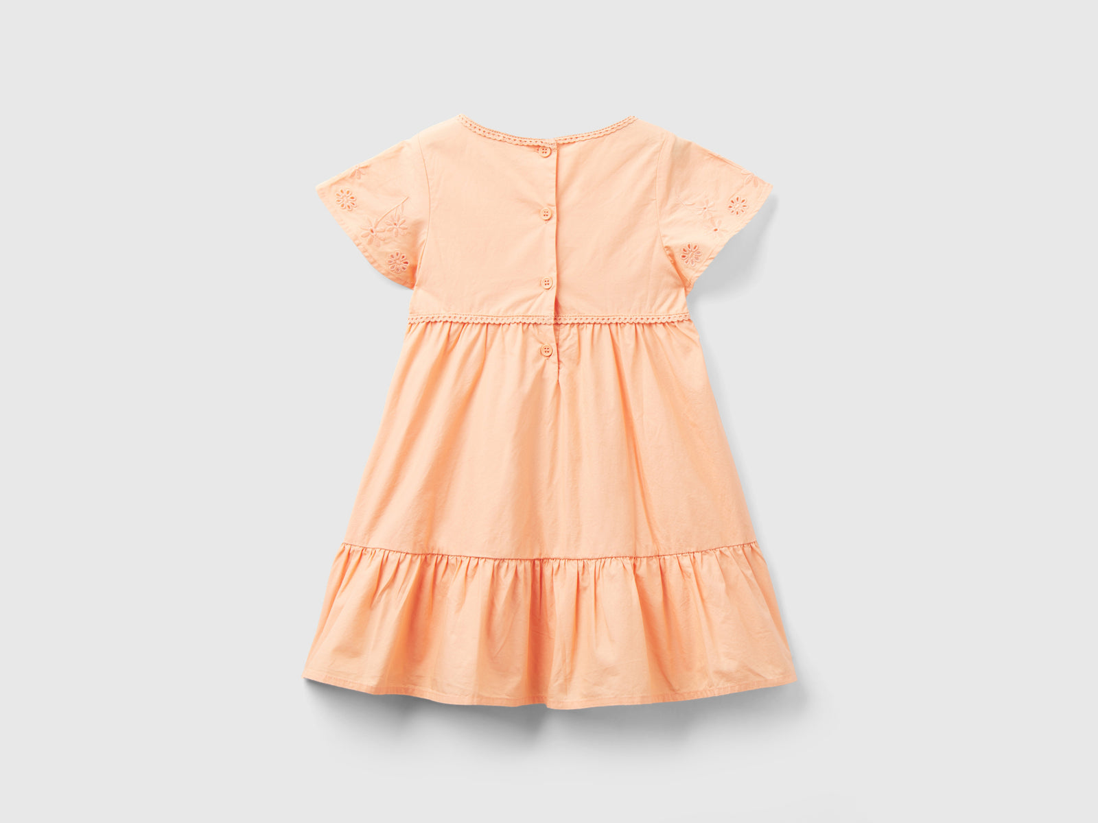 Abito con ricami e balza da bimba pesca 2 | Benetton Outlet