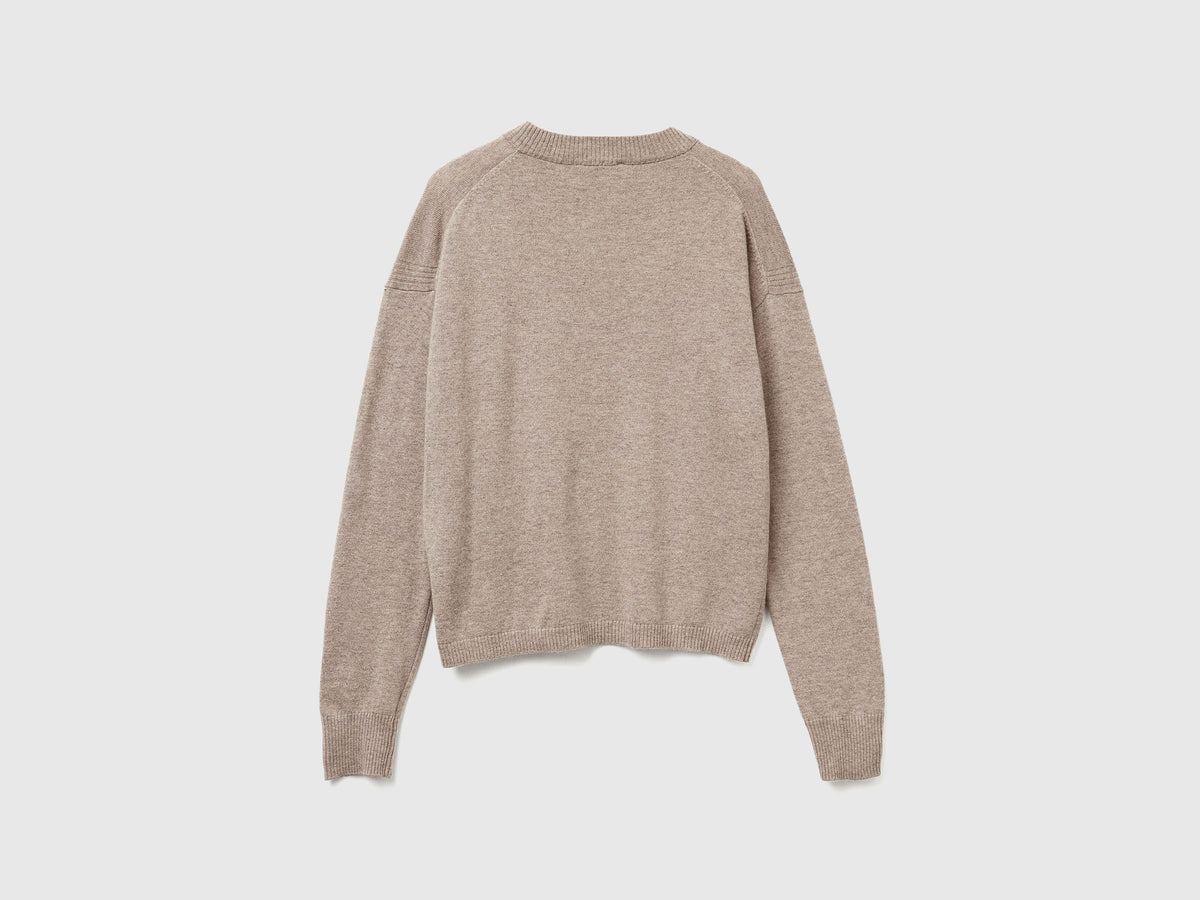 Maglione con scollo a V
