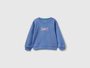 Felpa celeste in cotone bio con stampa glitter