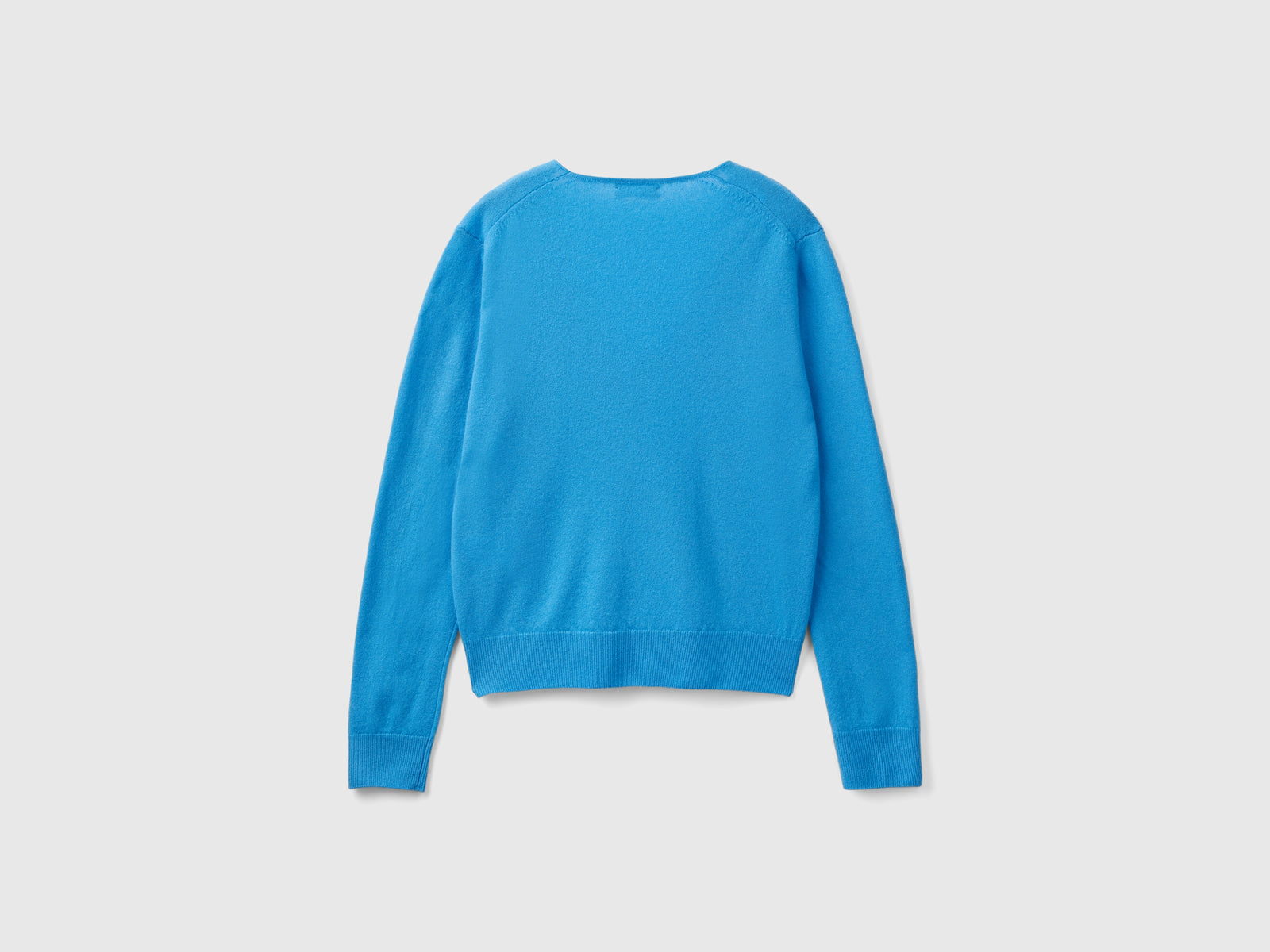 Maglione con scollo a V in pura lana Merino da donna azzurro 2 | Benetton Outlet