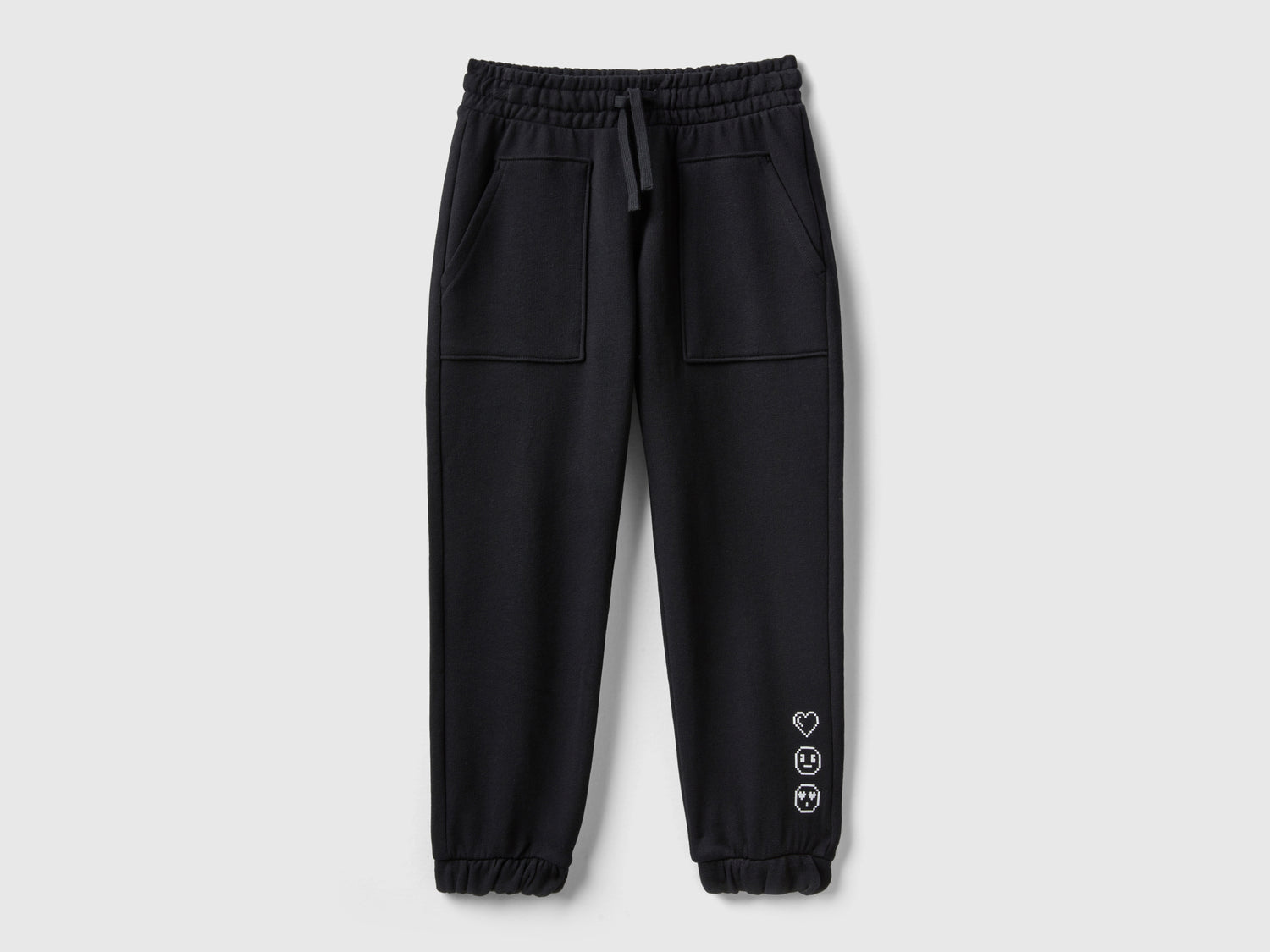 Joggers con tasche da bambina nero | Benetton Outlet