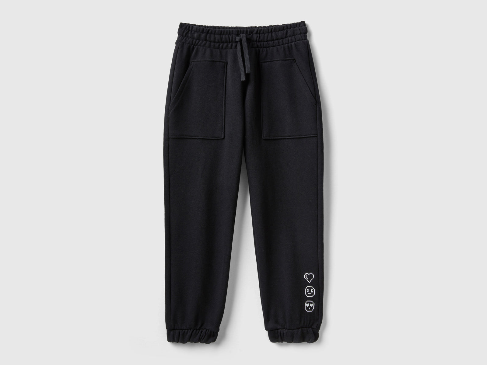 Joggers con tasche da bambina nero | Benetton Outlet